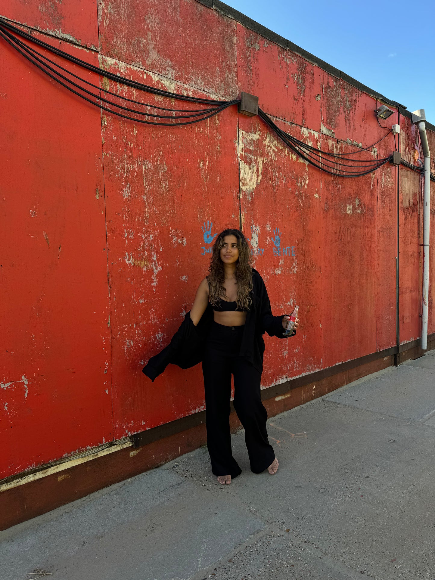 Minimalist black flare trousers