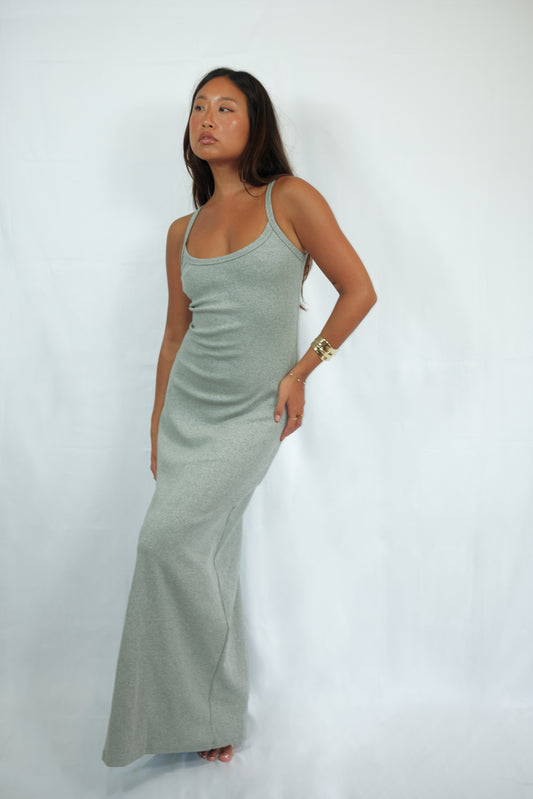 Model wearing a gray SESE maxi dress, 90% cotton 10% spandex